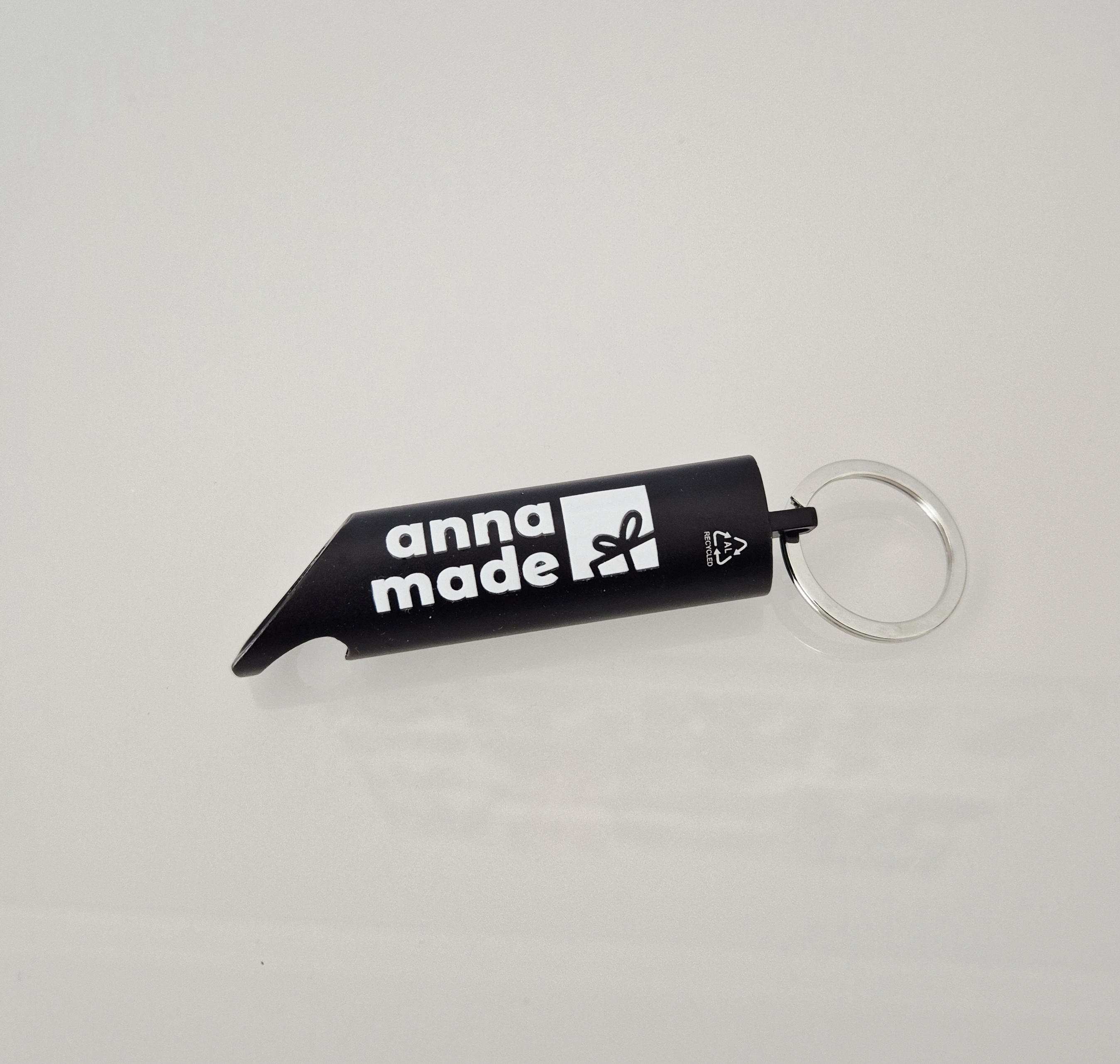 Taschenlampe mit Flaschenöffner als Schlüsselanhänger mit Logo-Druck 